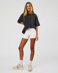 Woman wearing Shadow Mode FLXCotton Oversized Tee - Black Washed | Model:Georgia | Size:XS | Thumbnail Index: 7