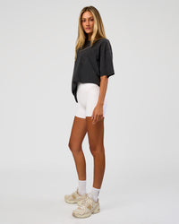 Woman wearing Shadow Mode FLXCotton Oversized Tee - Black Washed | Model:Georgia | Size:XS | Thumbnail Index: 10