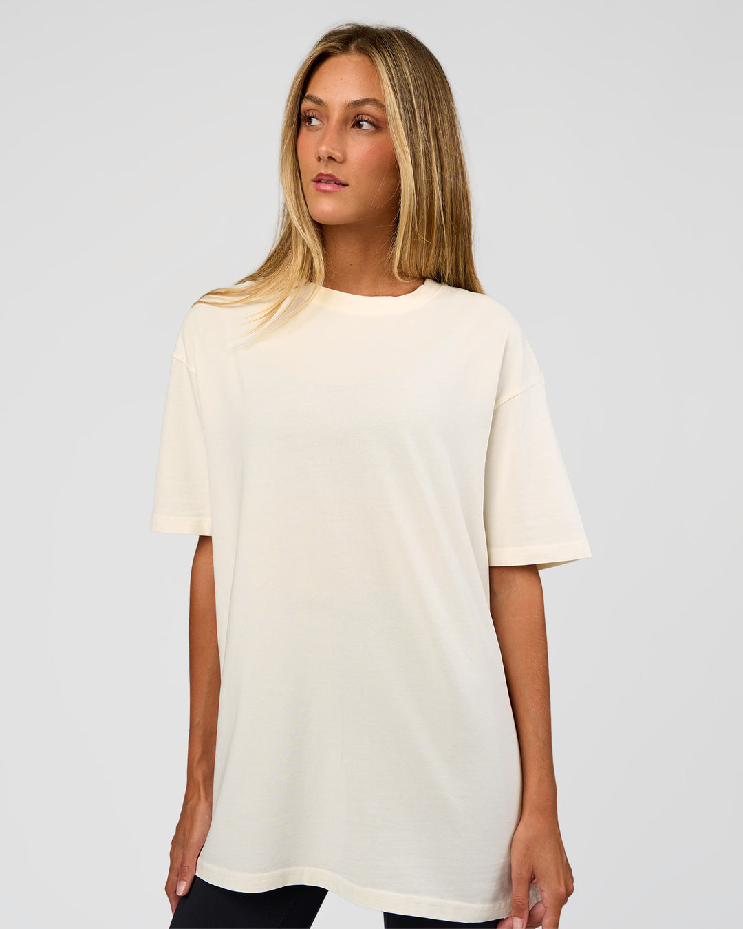 Woman wearing Shadow Mode FLXCotton Oversized Tee - Off White Washed | Model:Georgia | Size:XS - view 5