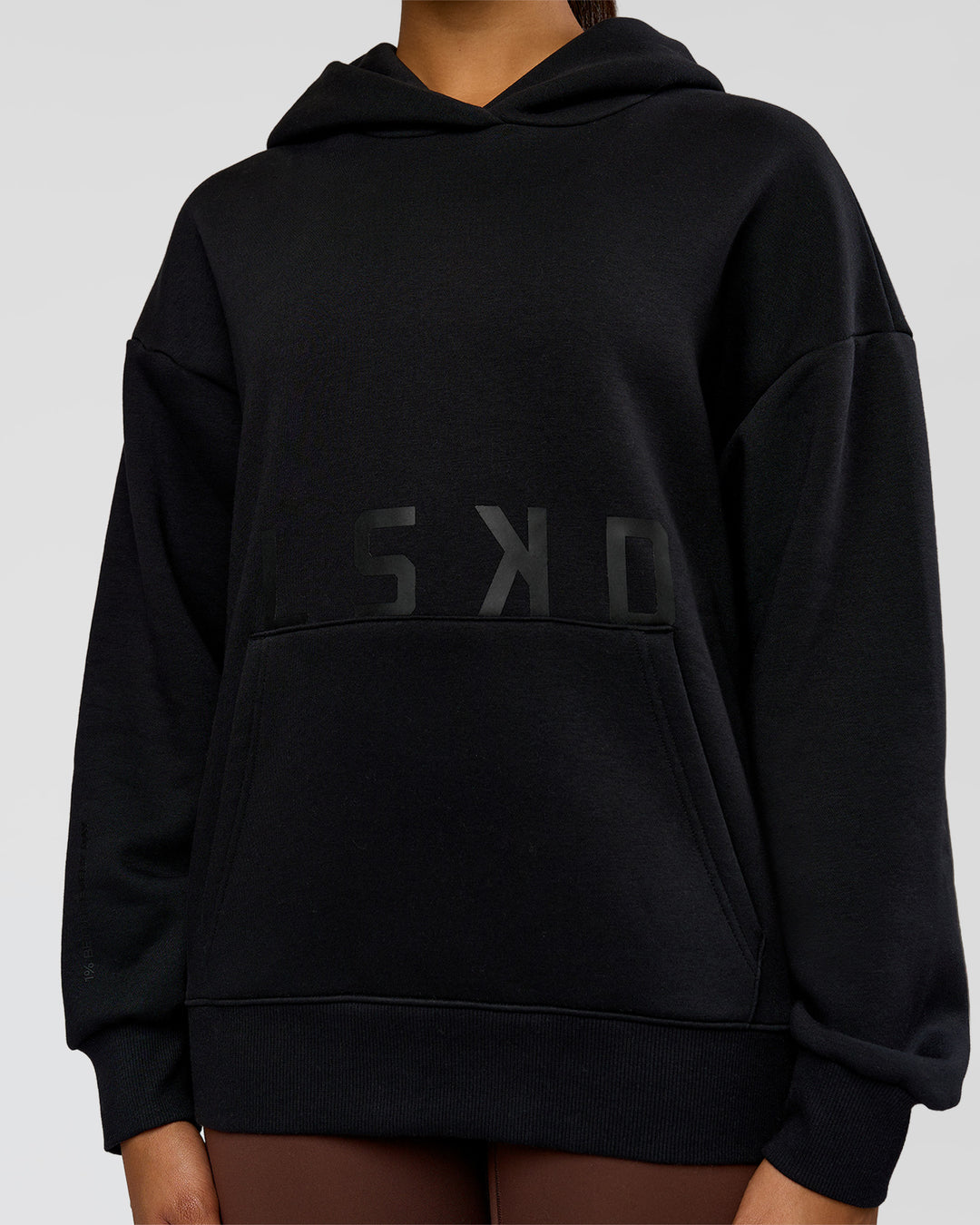 Woman wearing Shadow Mode Oversized Hoodie - Black | Model:Rosie | Size:XS - view 13