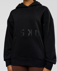 Woman wearing Shadow Mode Oversized Hoodie - Black | Model:Rosie | Size:XS | Thumbnail Index: 12