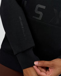 Woman wearing Shadow Mode Oversized Hoodie - Black | Model:Rosie | Size:XS | Thumbnail Index: 8