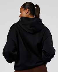Woman wearing Shadow Mode Oversized Hoodie - Black | Model:Rosie | Size:XS | Thumbnail Index: 7