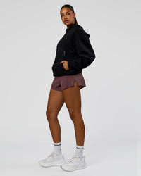 Woman wearing Shadow Mode Oversized Hoodie - Black | Model:Rosie | Size:XS | Thumbnail Index: 4