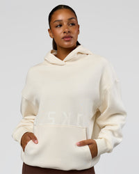 Woman wearing Shadow Mode Oversized Hoodie - Off White | Model:Rosie | Size:XS | Thumbnail Index: 3
