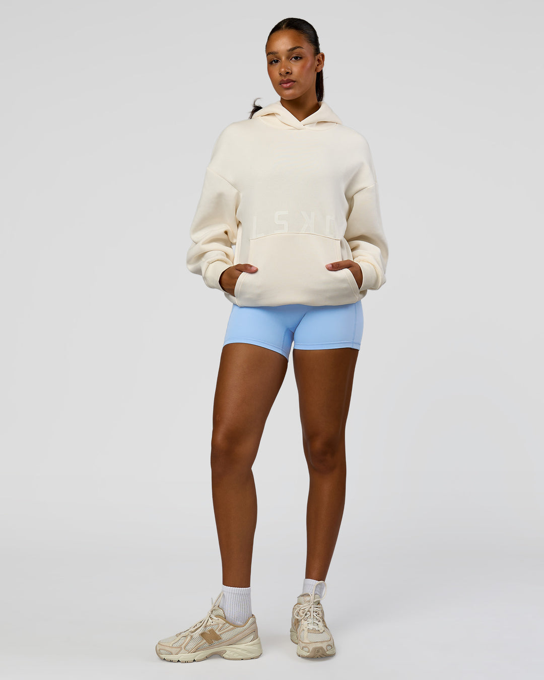 Woman wearing Shadow Mode Oversized Hoodie - Off White | Model:Rosie | Size:XS - view 14