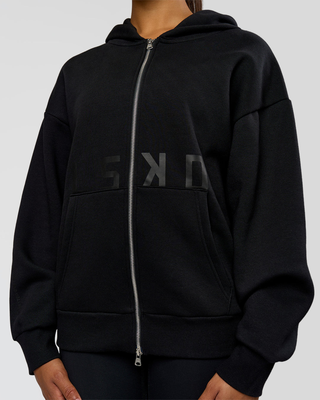 Woman wearing Shadow Mode Oversized Zip Through Hoodie - Black | Model:Rosie | Size:XS - view 14