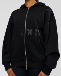 Woman wearing Shadow Mode Oversized Zip Through Hoodie - Black | Model:Rosie | Size:XS | Thumbnail Index: 13