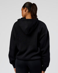 Woman wearing Shadow Mode Oversized Zip Through Hoodie - Black | Model:Rosie | Size:XS | Thumbnail Index: 9