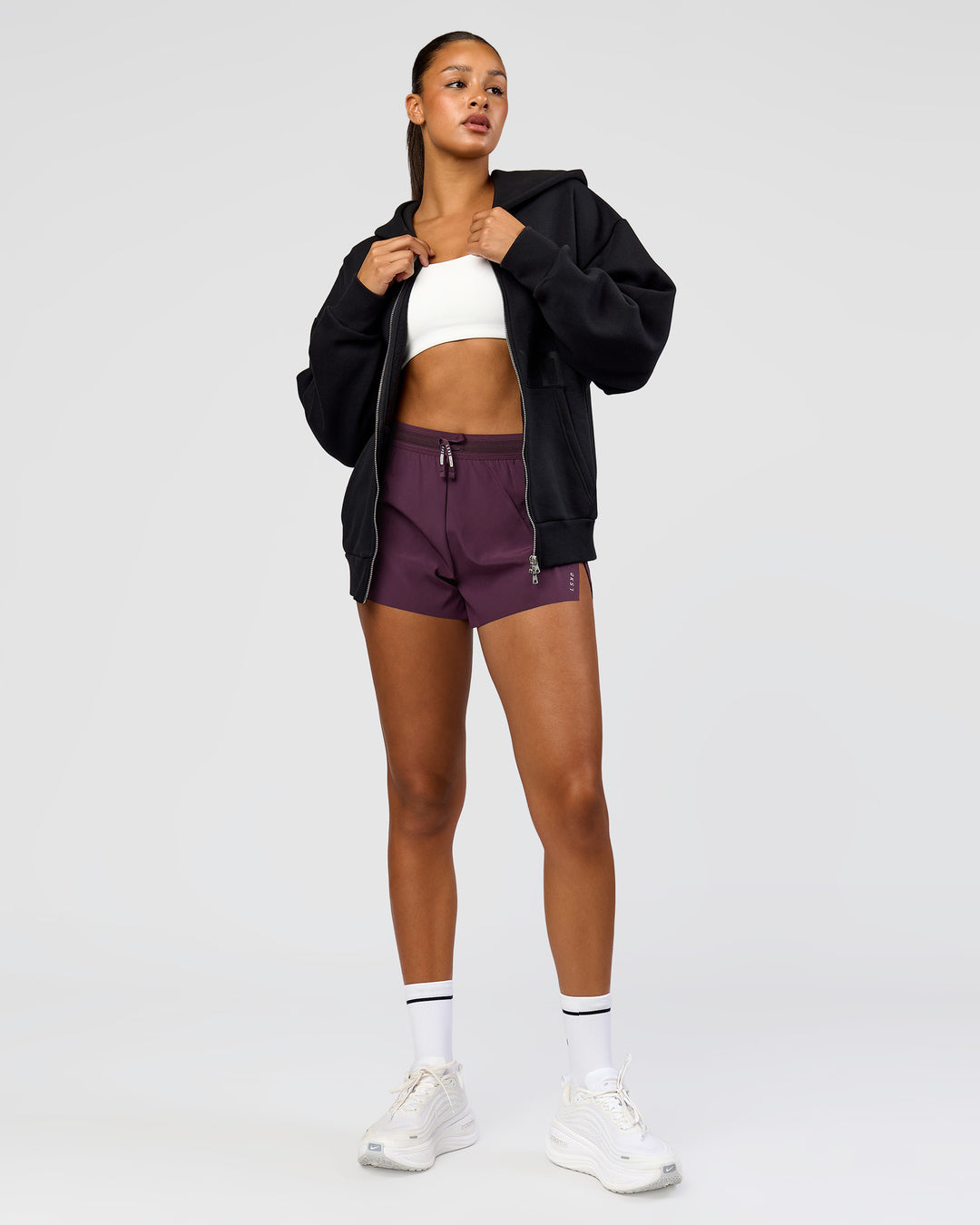 Woman wearing Shadow Mode Oversized Zip Through Hoodie - Black | Model:Rosie | Size:XS - view 3