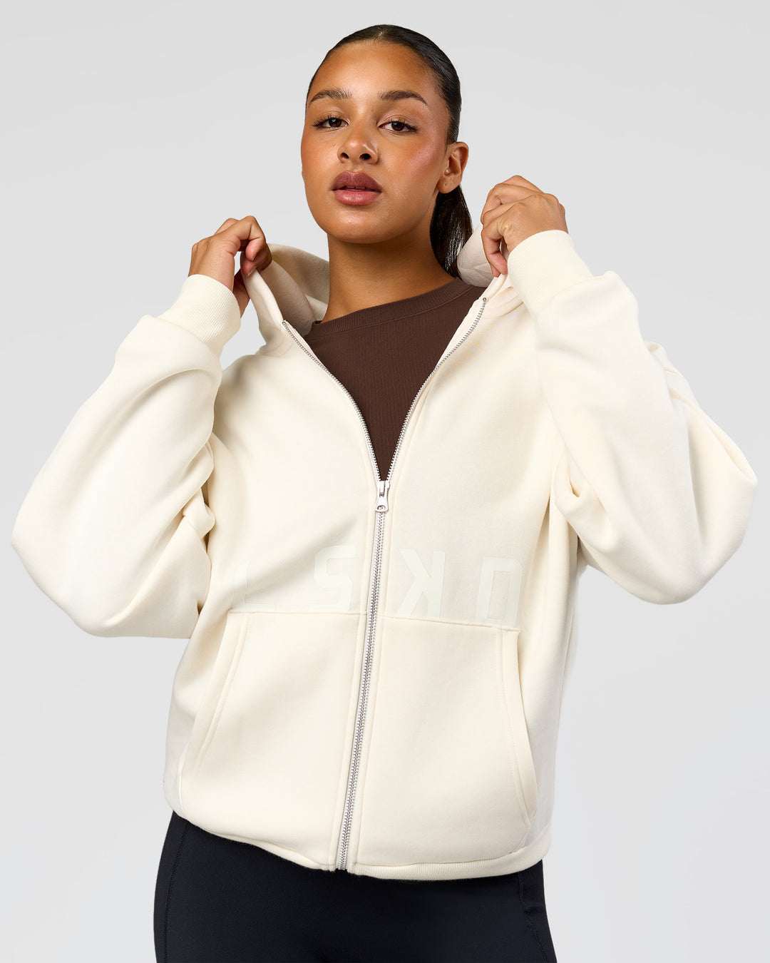 Woman wearing Shadow Mode Oversized Zip Through Hoodie - Off White | Model:Rosie | Size:XS - view 4