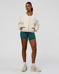 Woman wearing Shadow Mode Oversized Zip Through Hoodie - Off White | Model:Rosie | Size:XS | Thumbnail Index: 12