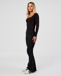 Woman wearing Show It Off Long Sleeve Top in Black | Model:Issy | Size:XS | Thumbnail Index: 3
