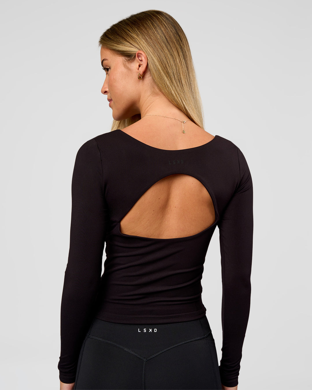 Woman wearing Show It Off Long Sleeve Top in Black | Model:Issy | Size:XS - view 6