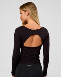 Woman wearing Show It Off Long Sleeve Top in Black | Model:Issy | Size:XS | Thumbnail Index: 5