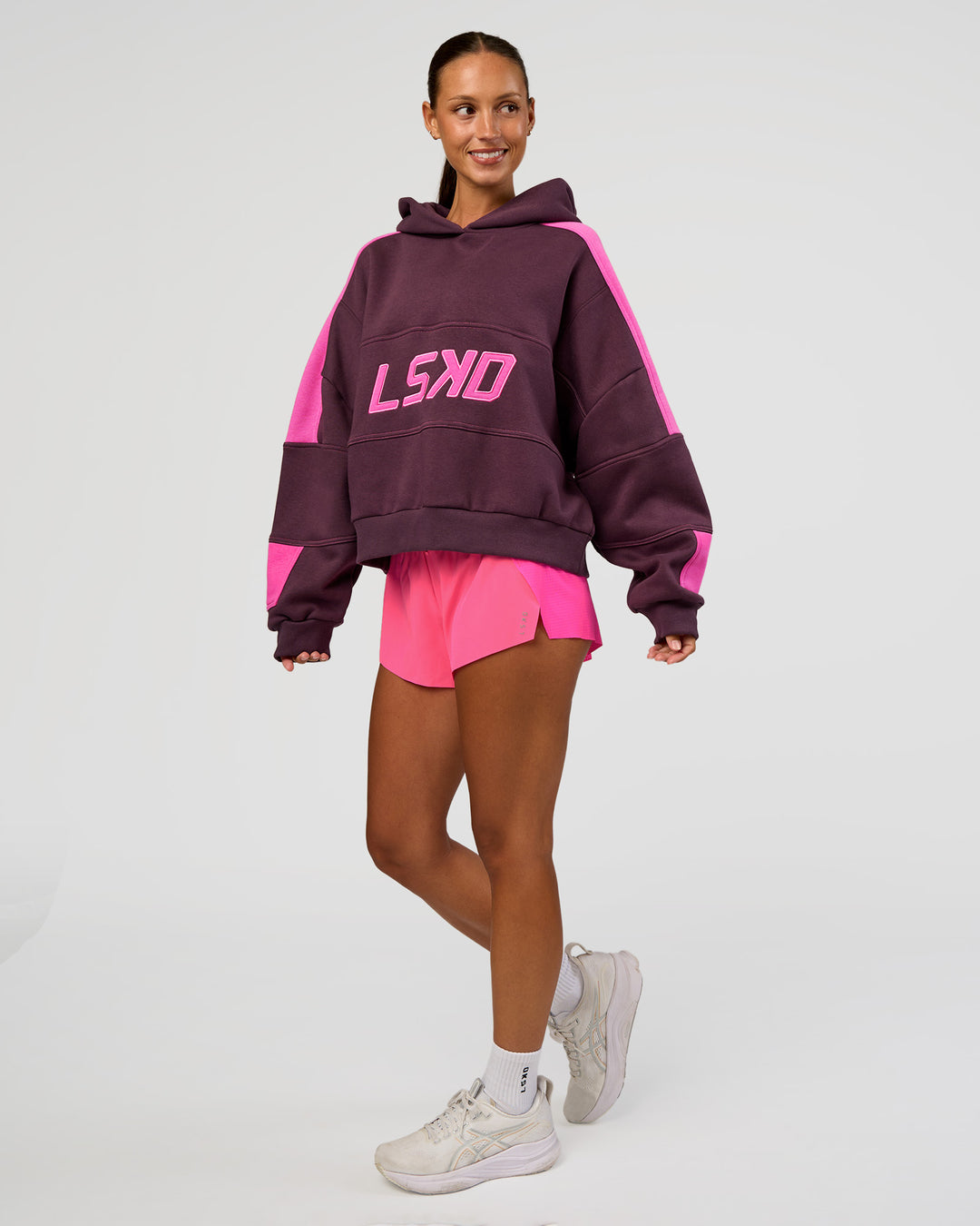 Woman wearing Slam Cropped Oversized Hoodie - Midnight Plum-Ultra Fuchsia | Model:Brylee | Size:XS - view 4