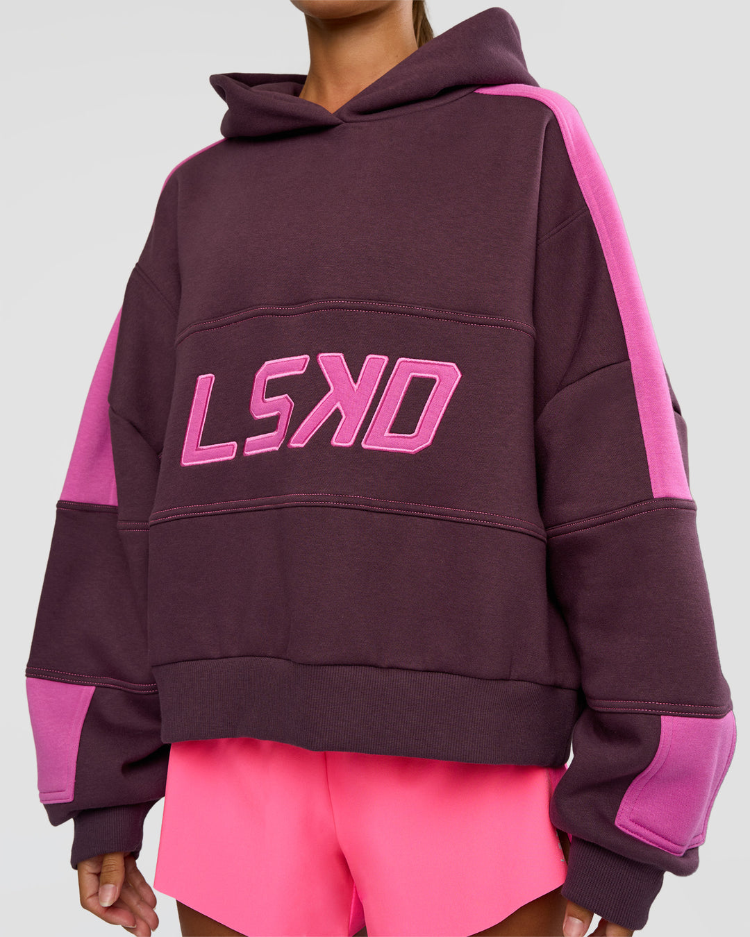 Woman wearing Slam Cropped Oversized Hoodie - Midnight Plum-Ultra Fuchsia | Model:Brylee | Size:XS - view 5