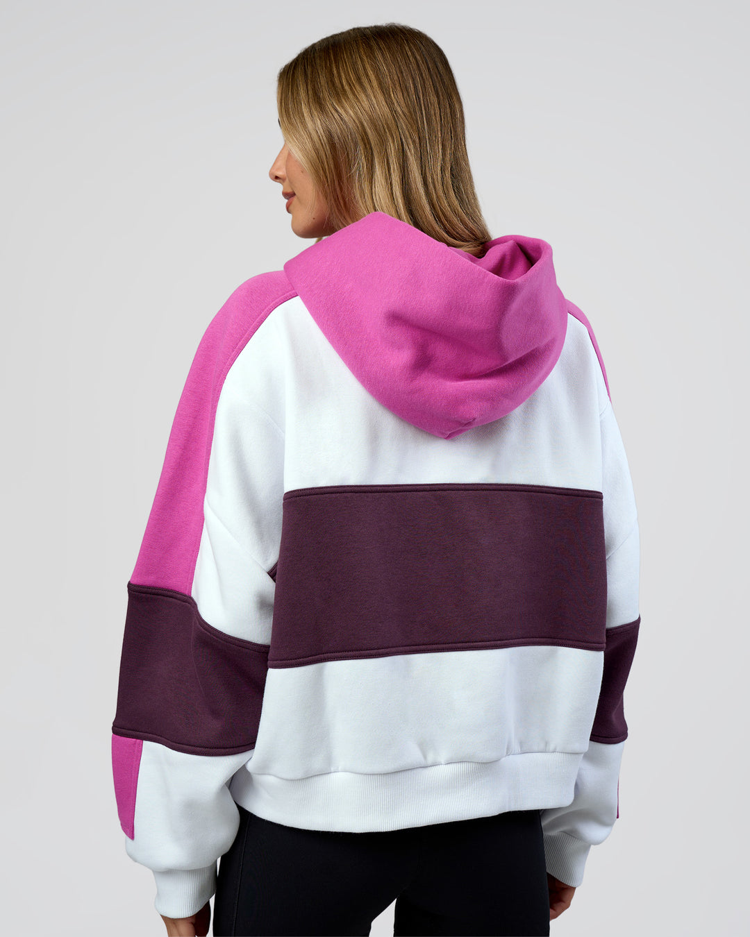 Woman wearing Slam Cropped Oversized Hoodie - White-Ultra Fuchsia | Model:Leilani | Size:XS - view 4
