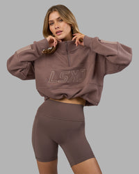 Woman wearing Slam Quarter Zip Sweater - Peppercorn | Model:Leilani | Size:XS | Thumbnail Index: 0