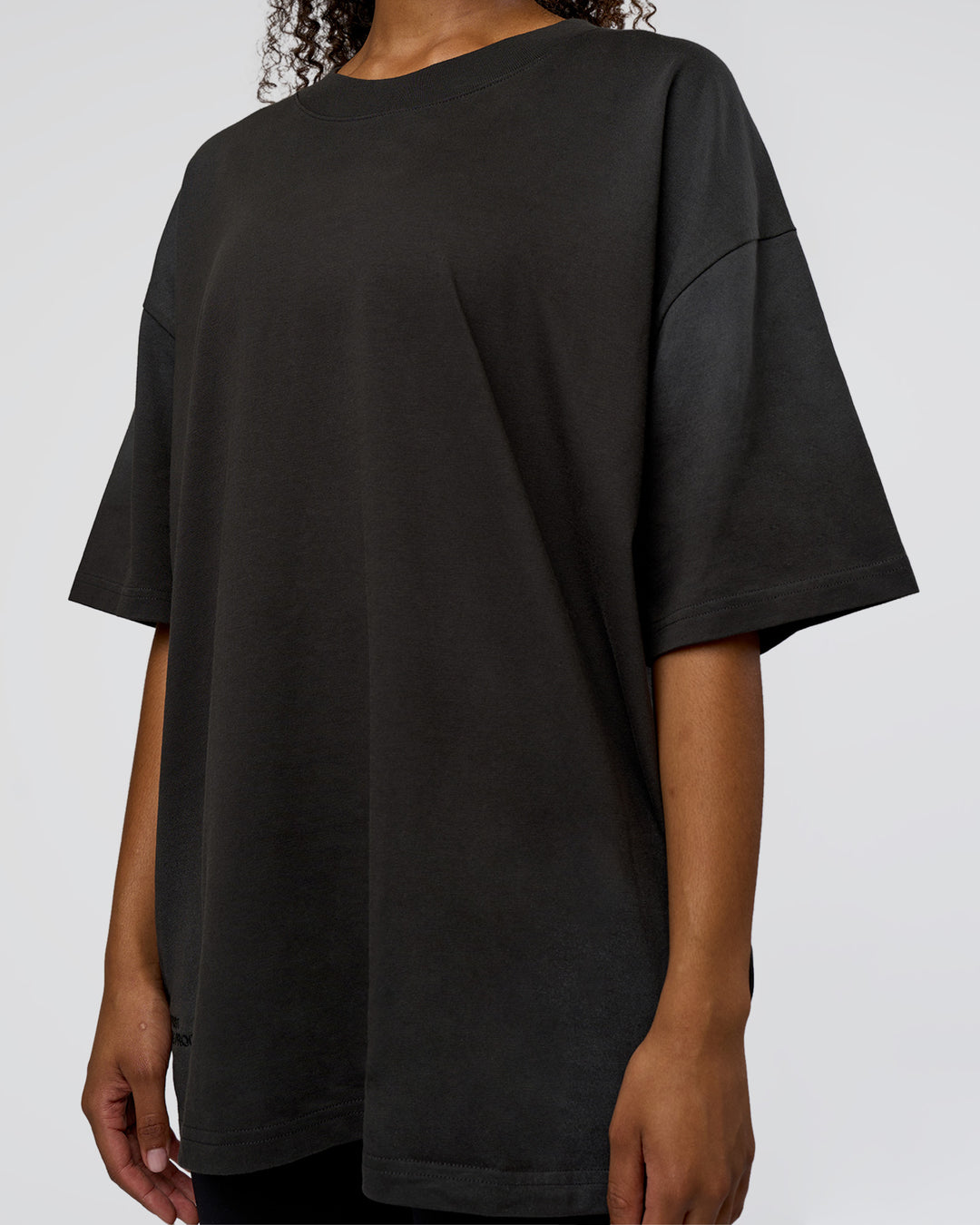Woman wearing Spray Heavyweight Unisex Oversized Tee - Charcoal Washed | Model:Jordan | Size:S - view 8