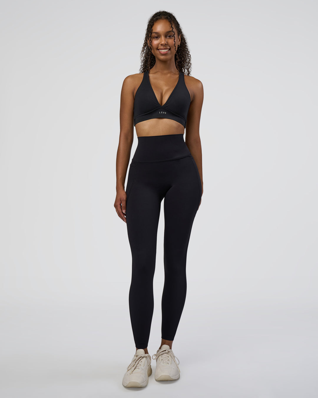 Woman wearing Stamina Sports Bra D/DD/E - Black | Model:Jordan | Size:XS - view 5