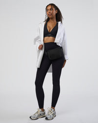 Woman wearing Stamina Sports Bra D/DD/E - Black | Model:Jordan | Size:XS | Thumbnail Index: 2