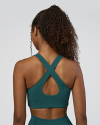 Woman wearing Stamina Sports Bra D/DD/E - Transformative Teal | Model:Jordan | Size:XS | Thumbnail Index: 1