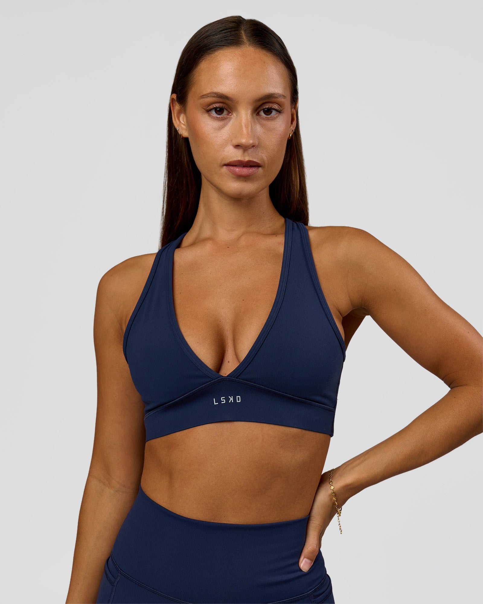 Woman wearing Stamina Sports Bra - Future Navy | Model:Brylee | Size:XS