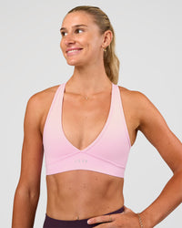 Woman wearing Stamina Sports Bra - Marshmallow | Set:true | Angle:front | Model:Emelia | Size:XS | Thumbnail Index: 0