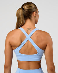 Woman wearing Stamina Sports Bra - Open Air | Set:true | Angle:back | Model:Maja | Size:XS | Thumbnail Index: 1