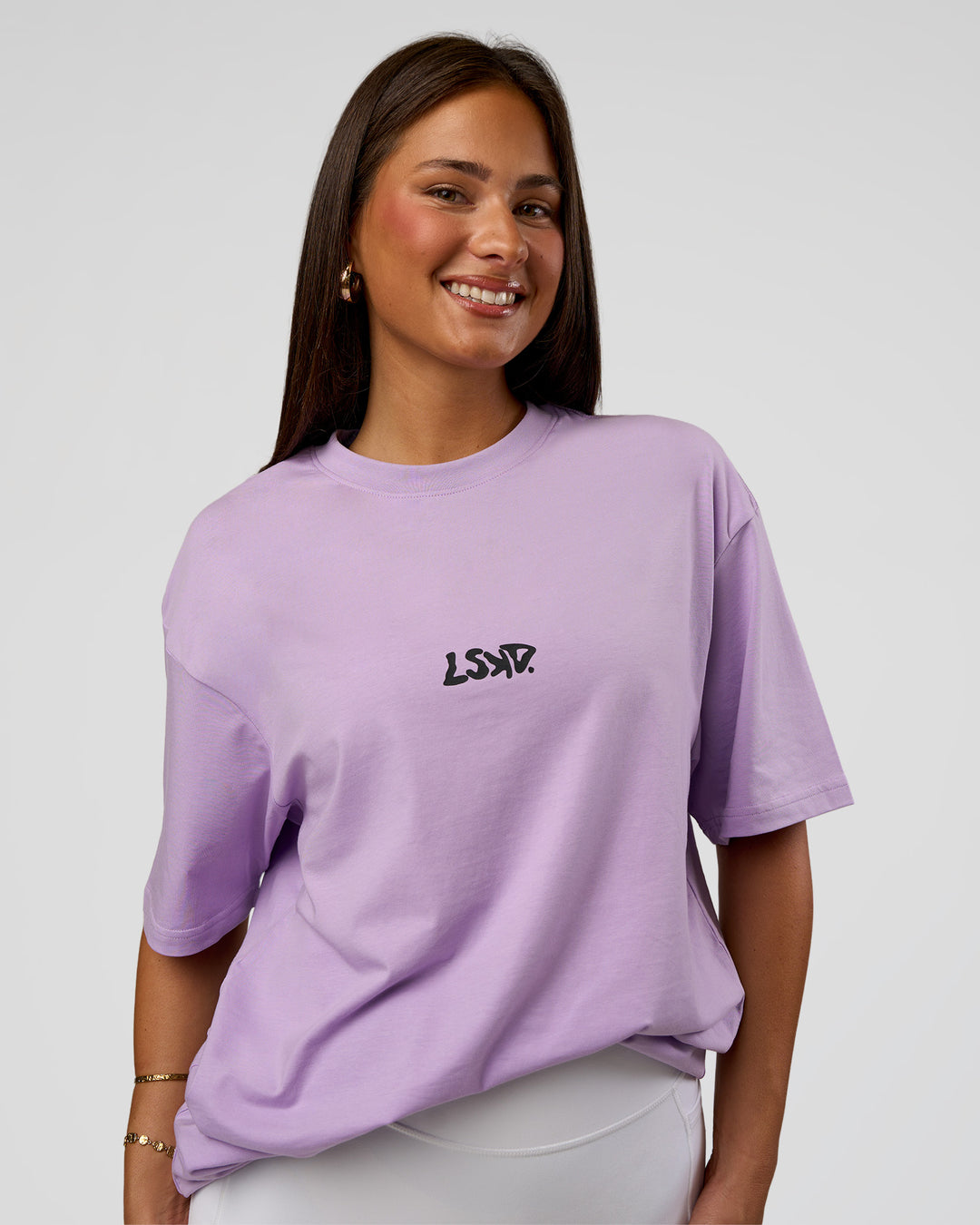 Woman wearing Standard Issue FLXCotton Oversized Tee - Pale Lilac-Black | Model:Bianca | Size:XS - view 5