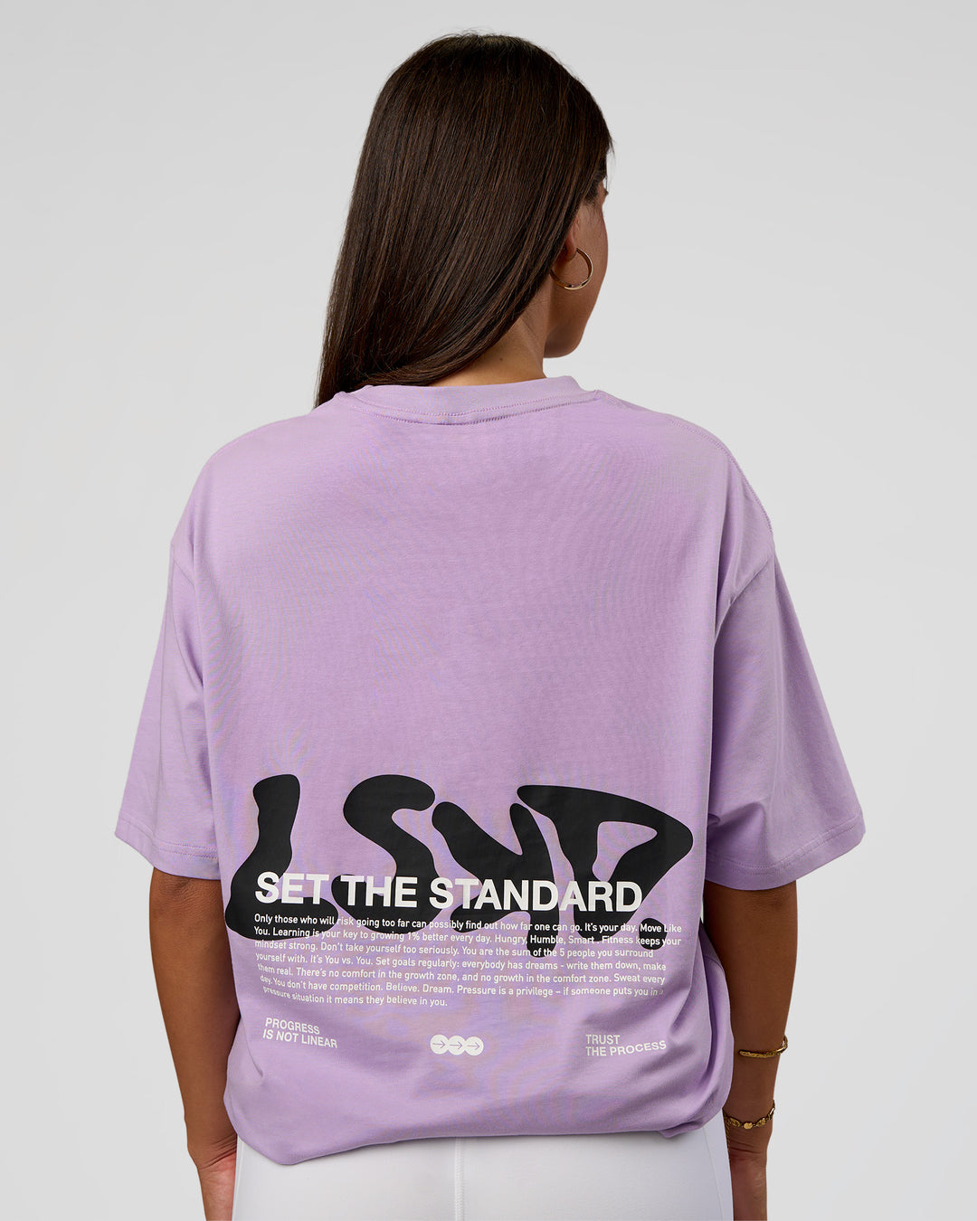 Woman wearing Standard Issue FLXCotton Oversized Tee - Pale Lilac-Black | Model:Bianca | Size:XS - view 4