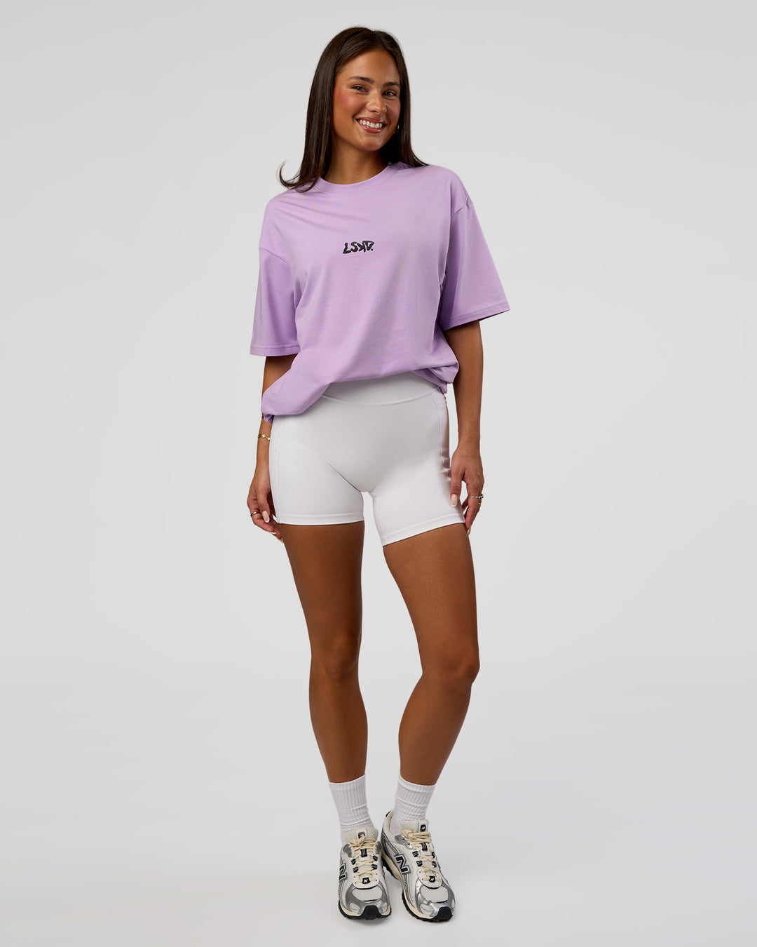 Woman wearing Standard Issue FLXCotton Oversized Tee - Pale Lilac-Black | Model:Bianca | Size:XS - view 9