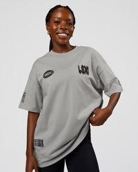 Woman wearing Static Grit Heavyweight Oversized Tee - Alloy-Black | Model:Ellie | Size:XS | Thumbnail Index: 3