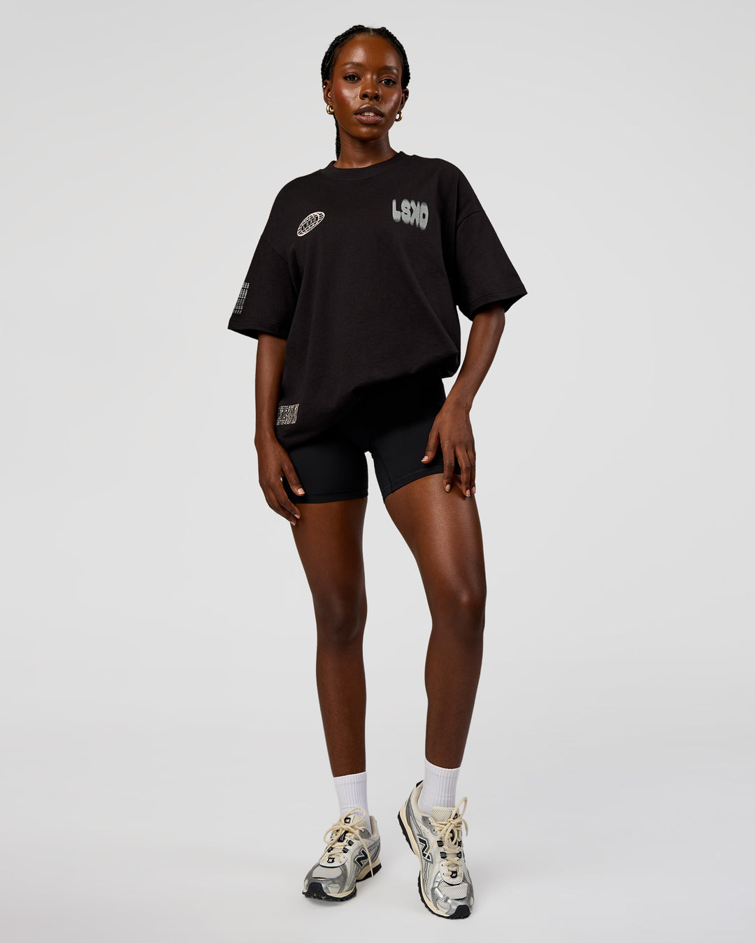 Woman wearing Static Grit Heavyweight Oversized Tee - Black-Alloy | Model:Ellie | Size:XS - view 9