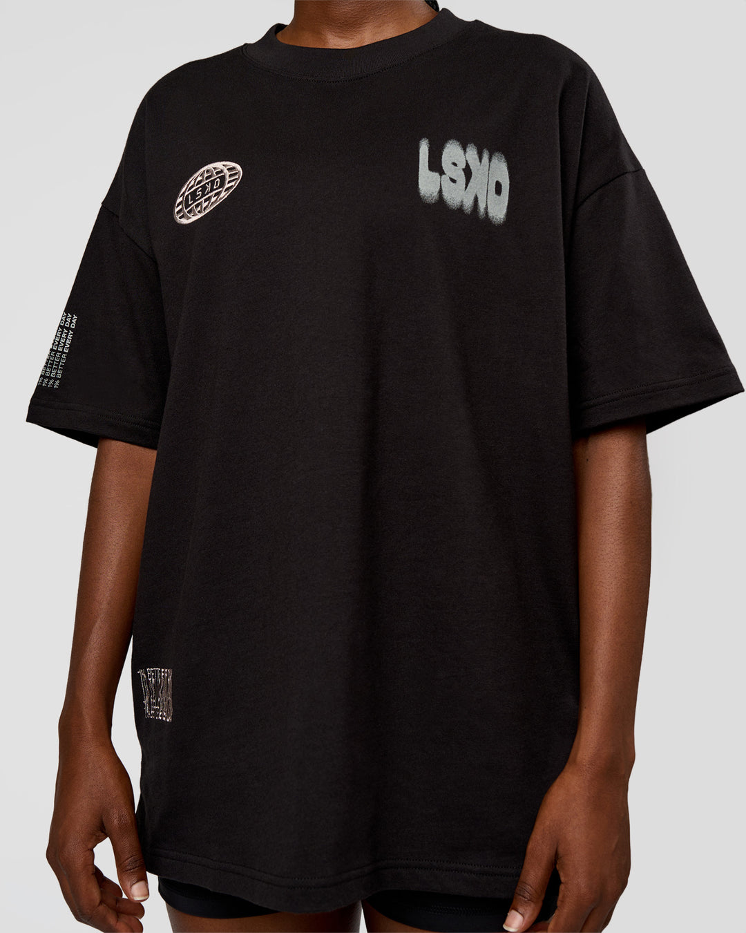 Woman wearing Static Grit Heavyweight Oversized Tee - Black-Alloy | Model:Ellie | Size:XS - view 12
