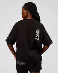 Woman wearing Static Grit Heavyweight Oversized Tee - Black-Alloy | Model:Ellie | Size:XS | Thumbnail Index: 7