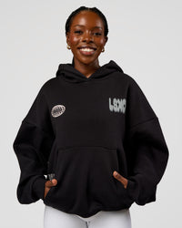 Woman wearing Static Grit Unisex Boxy Hoodie - Black-Alloy | Model:Ellie | Size:XS | Thumbnail Index: 3