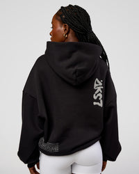 Woman wearing Static Grit Unisex Boxy Hoodie - Black-Alloy | Model:Ellie | Size:XS | Thumbnail Index: 7
