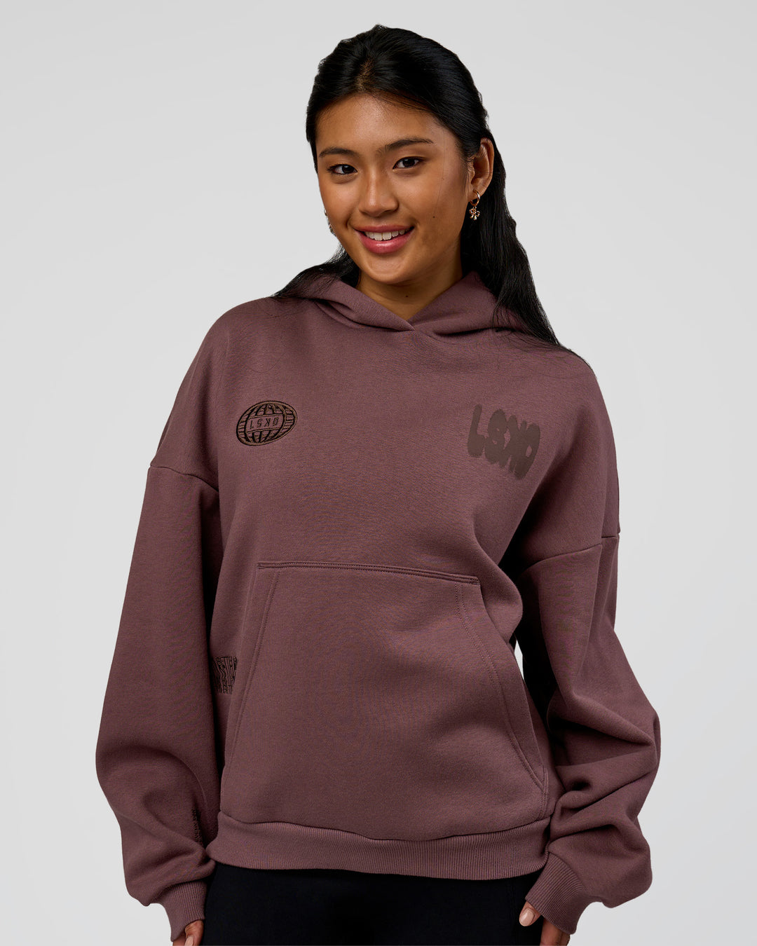 Woman wearing Static Grit Unisex Boxy Hoodie - Cocoa Powder-Hot Chocolate | Model:Loren | Size:XS - view 4
