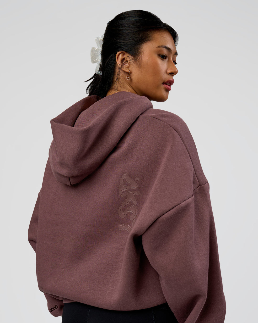 Woman wearing Static Grit Unisex Boxy Hoodie - Cocoa Powder-Hot Chocolate | Model:Loren | Size:XS - view 5