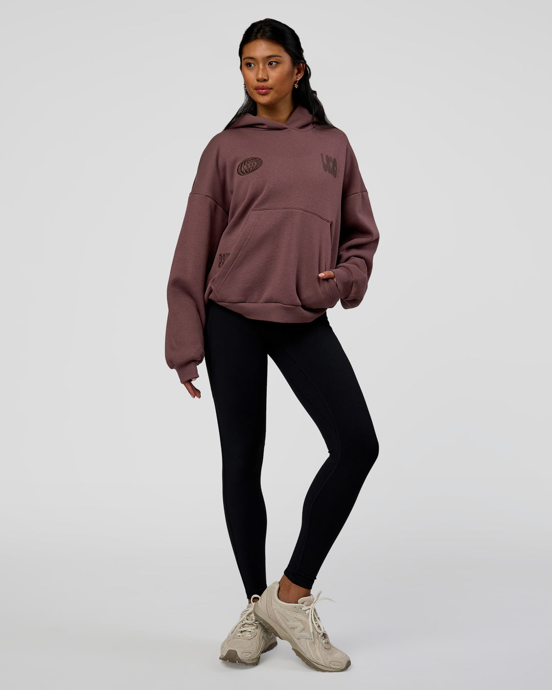 Woman wearing Static Grit Unisex Boxy Hoodie - Cocoa Powder-Hot Chocolate | Model:Loren | Size:XS - view 8