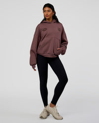 Woman wearing Static Grit Unisex Boxy Hoodie - Cocoa Powder-Hot Chocolate | Model:Loren | Size:XS | Thumbnail Index: 7