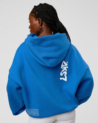 Woman wearing Static Grit Unisex Boxy Hoodie - Palace Blue-White | Model:Ellie | Size:XS | Thumbnail Index: 5