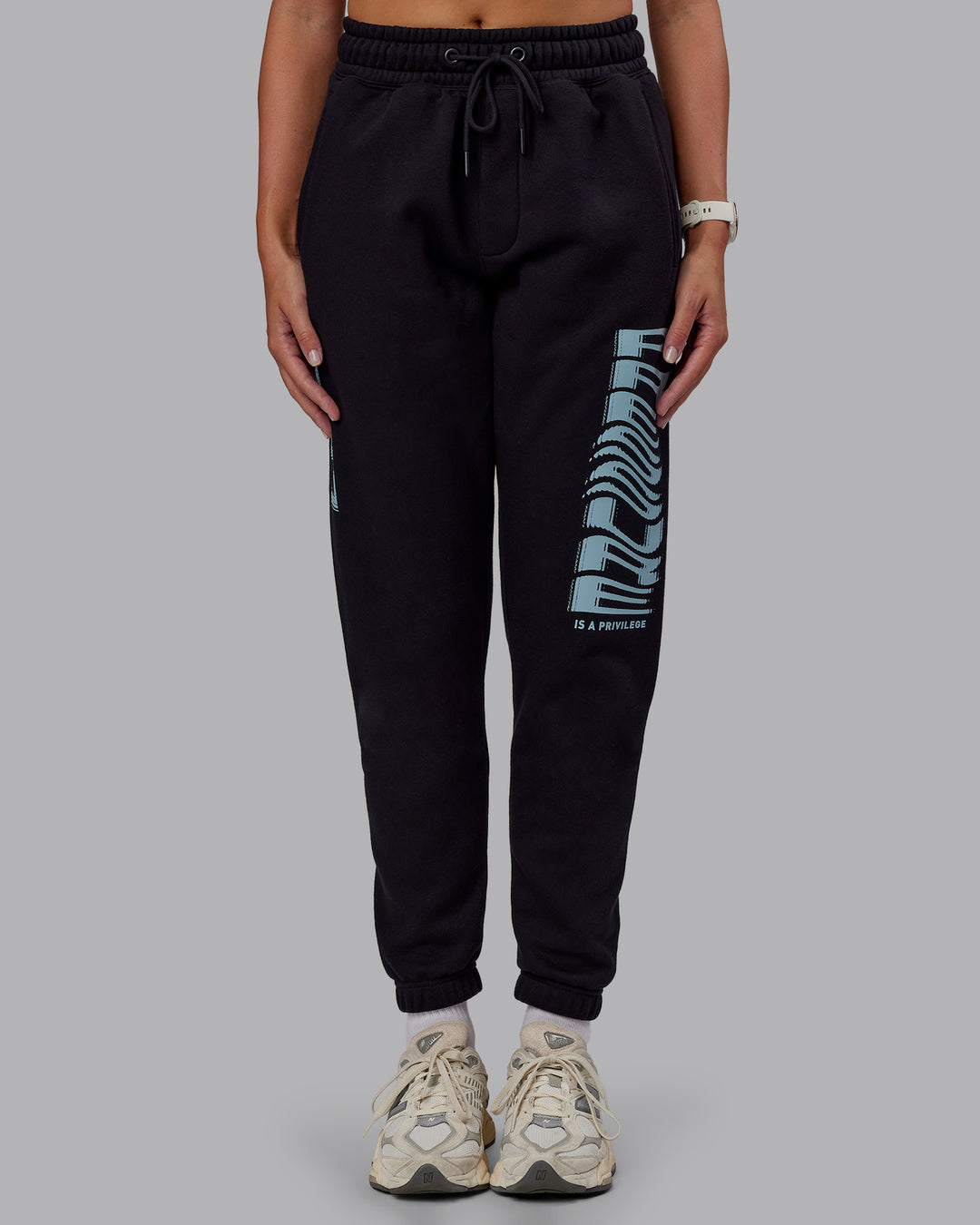 Woman wearing Static Track Pant - Black-Skyride | Model:Phoebe | Size:XS - view 11