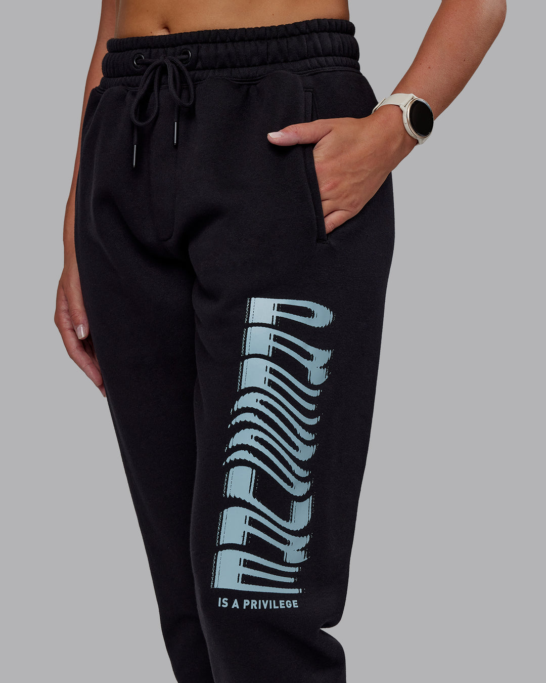 Woman wearing Static Track Pant - Black-Skyride | Model:Phoebe | Size:XS - view 5