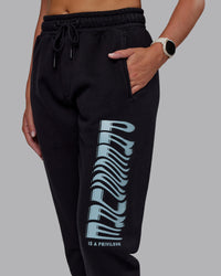 Woman wearing Static Track Pant - Black-Skyride | Model:Phoebe | Size:XS | Thumbnail Index: 4