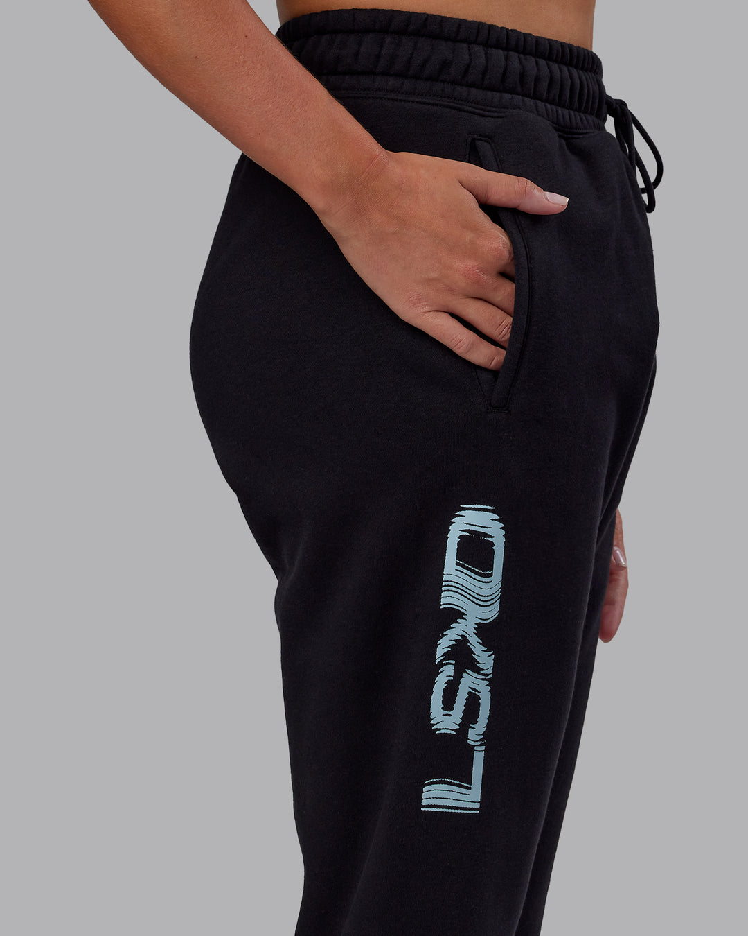 Woman wearing Static Track Pant - Black-Skyride | Model:Phoebe | Size:XS - view 6