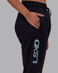 Woman wearing Static Track Pant - Black-Skyride | Model:Phoebe | Size:XS | Thumbnail Index: 5