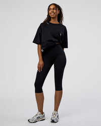 Woman wearing Sticker Heavyweight Oversized Tee - Black-White | Model:Jordan | Size:XS | Thumbnail Index: 4